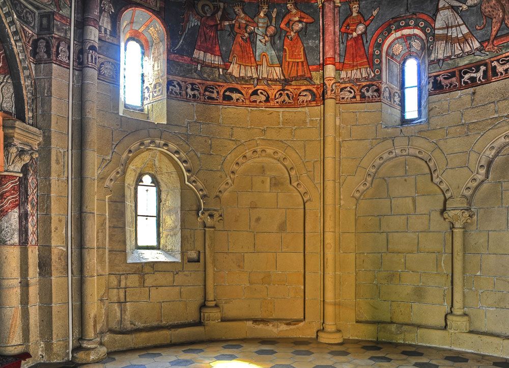 Interior of the charnel house on the first floor with frescoes on the walls 