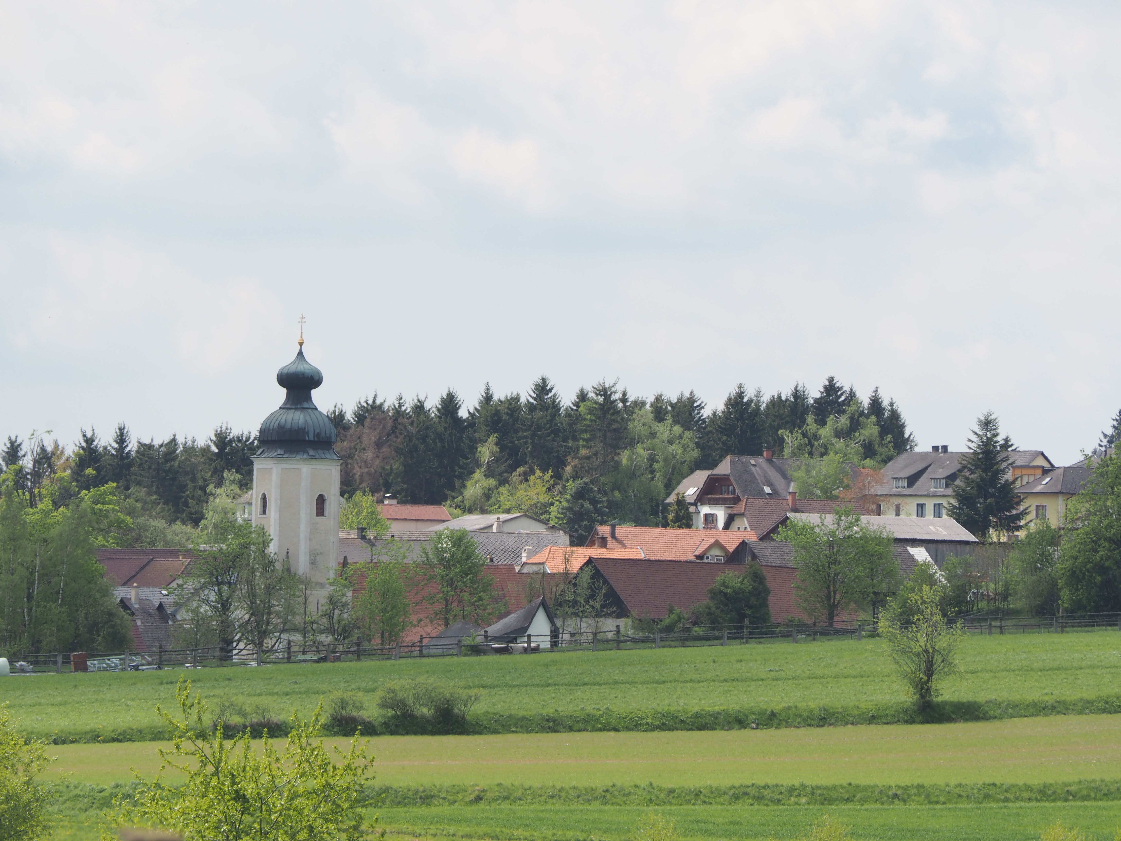 Sallingberg parish church with onion dome in a rural setting.