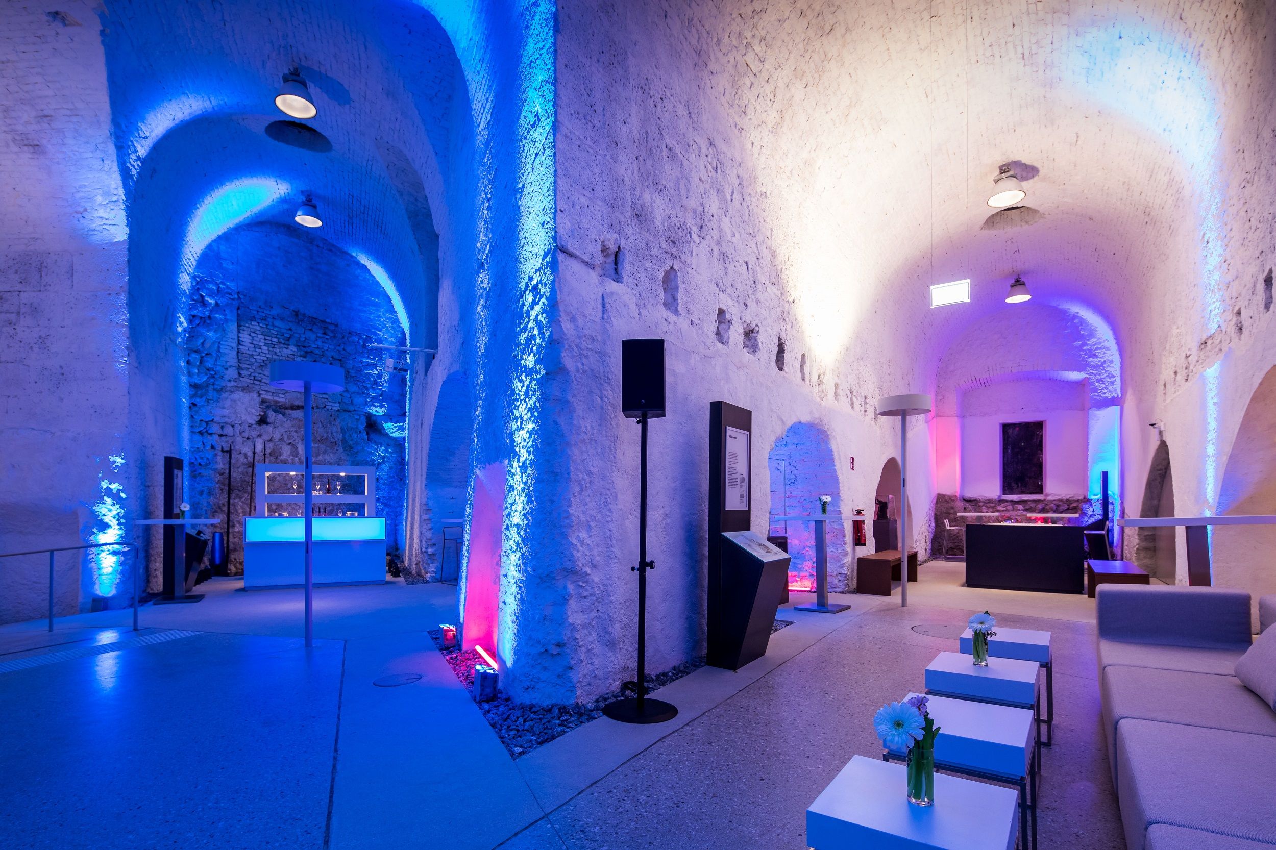 Interior view of the Kasematten, Strada Coperta Lounge with blue lighting.
