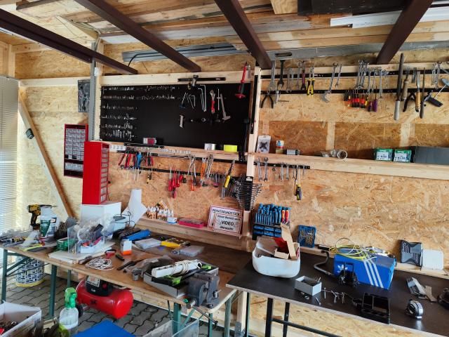 Bike workshop with workbench and lots of tools 