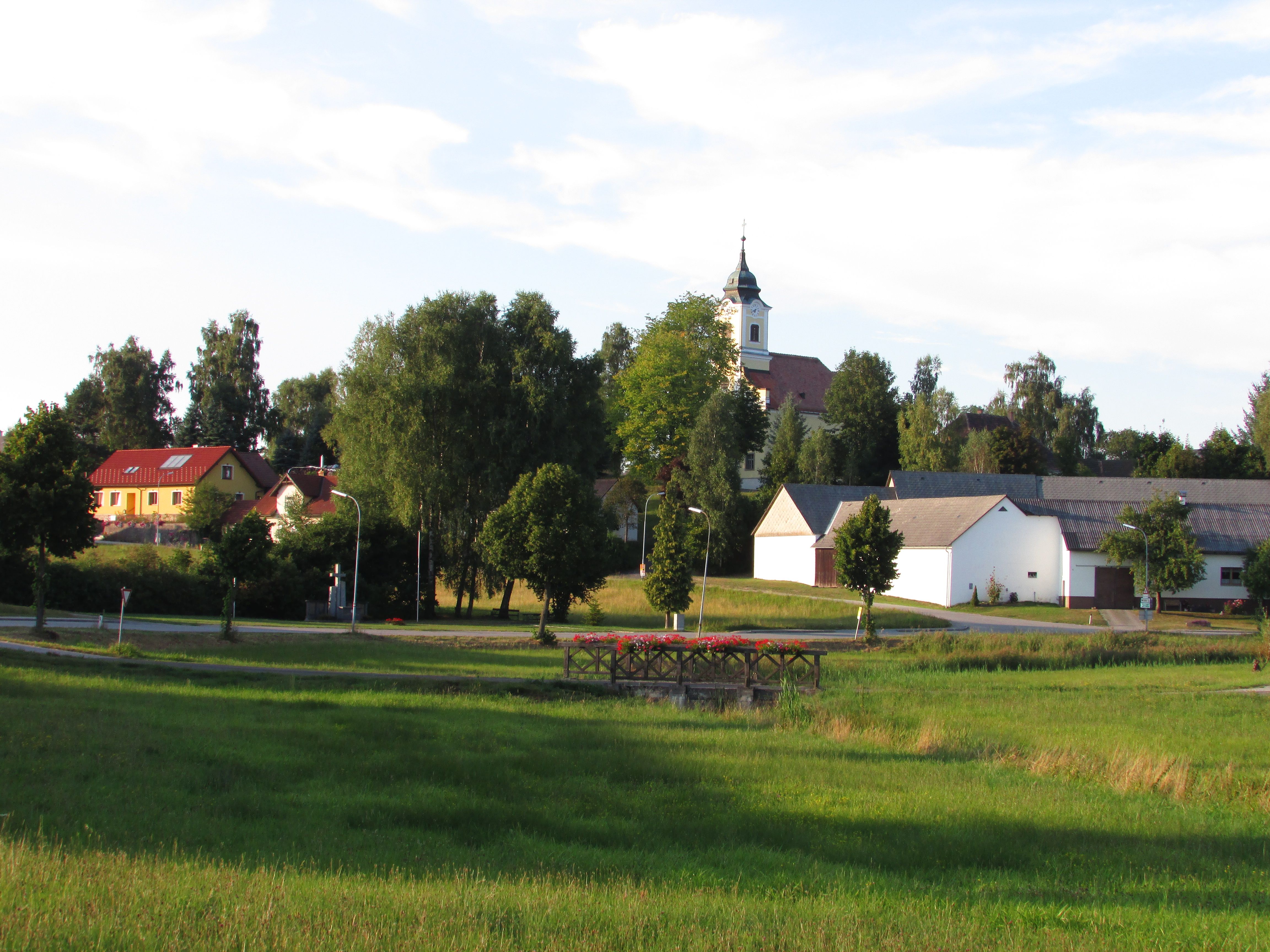 Rural scene with church and houses in Haugschlag.