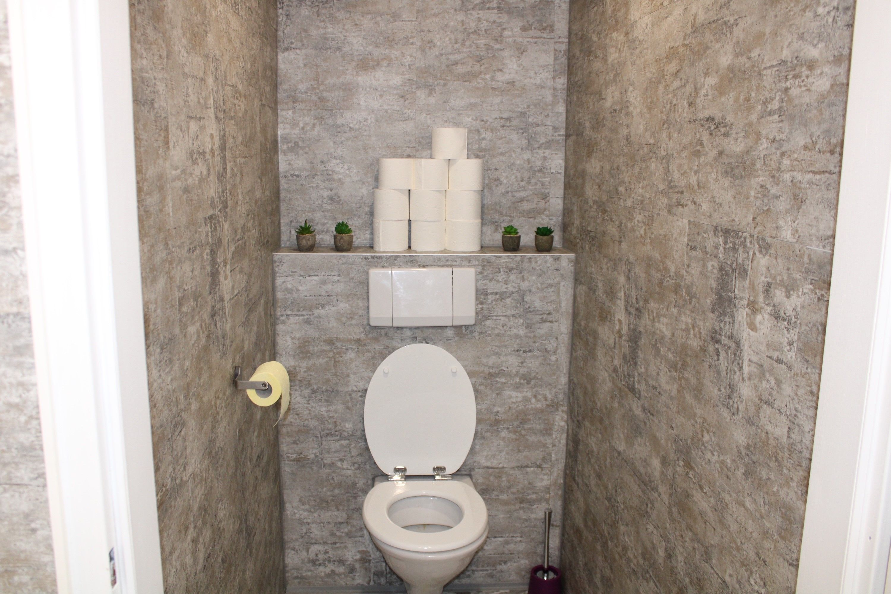 Modern WC with gray tiles