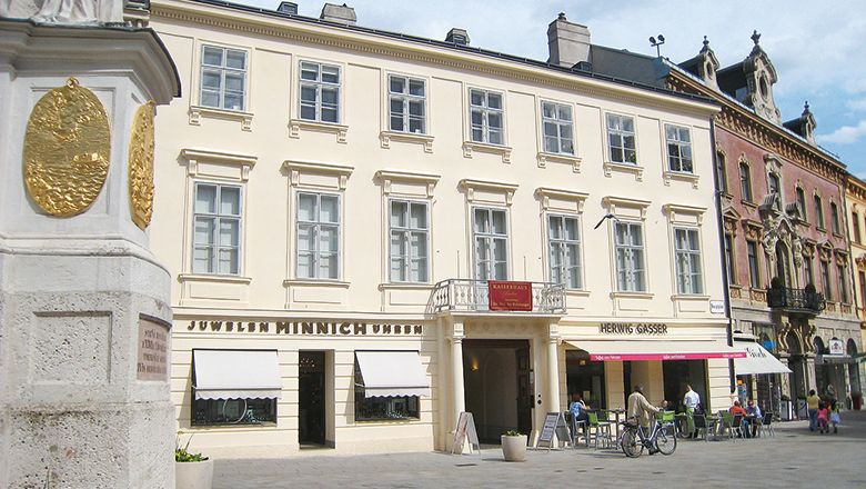 Historic building in Baden with stores on the first floor.