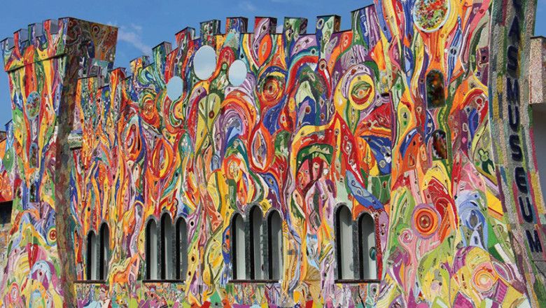Colorful painted facade of a museum with castle design.