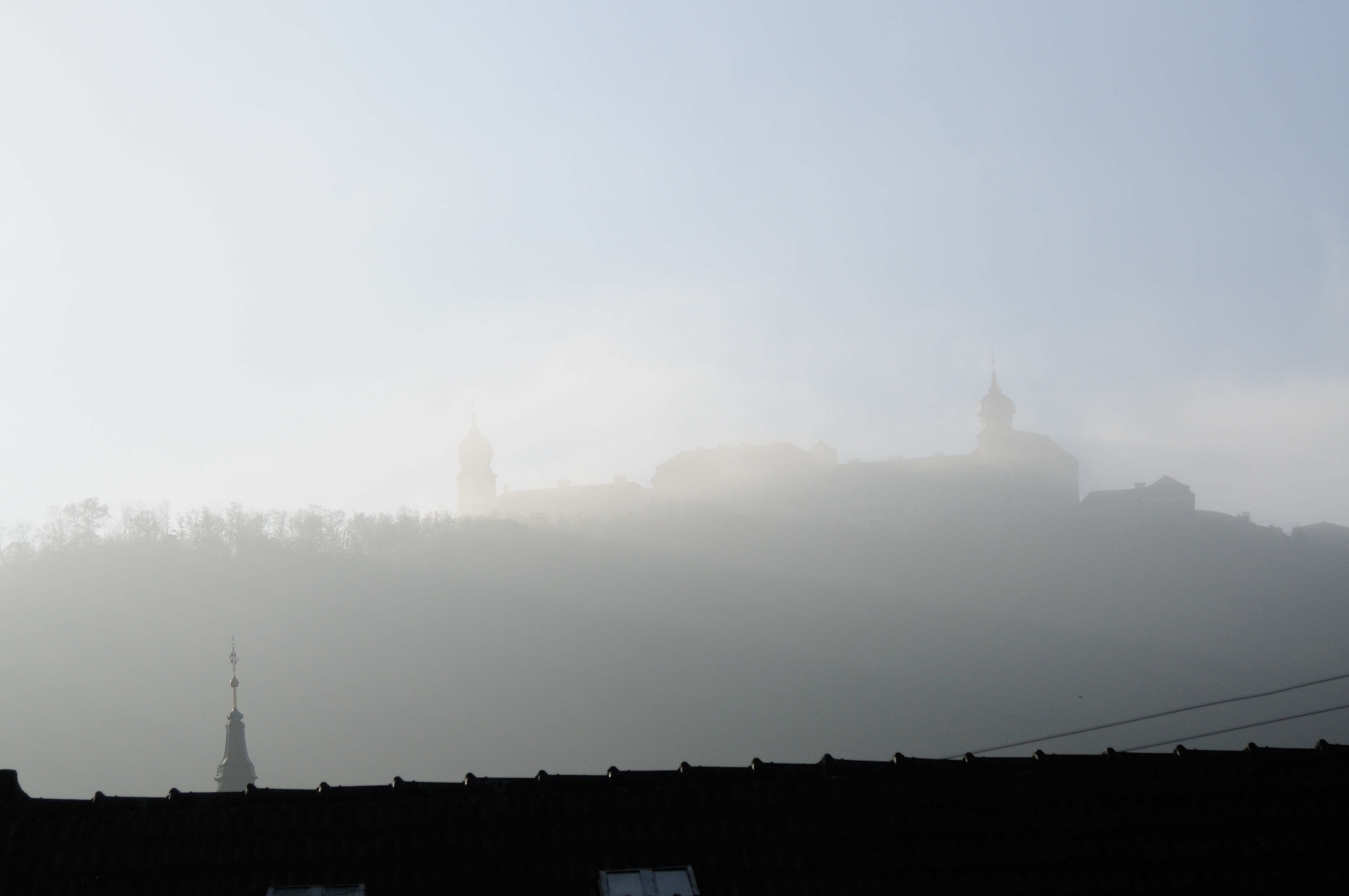 Fog-shrouded silhouette of Göttweig in the fall.