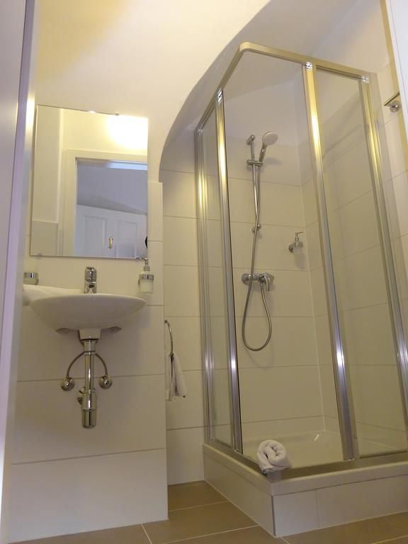 Bathroom with washbasin and shower 