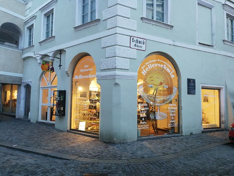 Entrance to a store called Hellerschmid in an old town street.