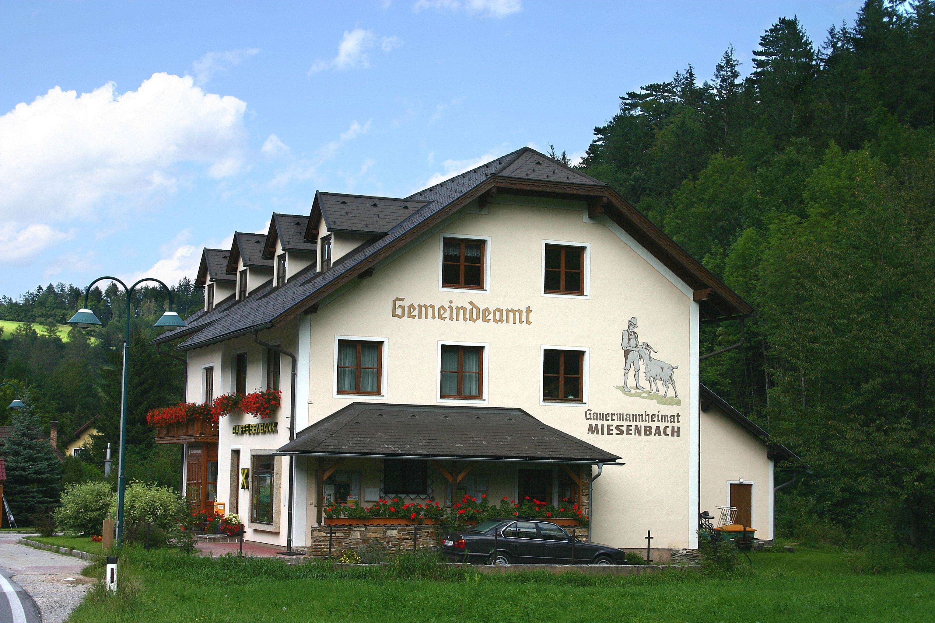 Miesenbach municipal office with surrounding nature.