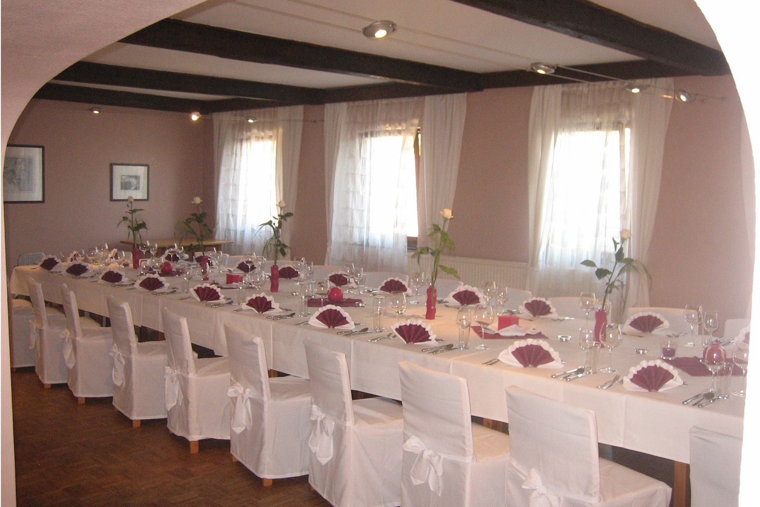 Elegant dining room with table setting for a celebration.
