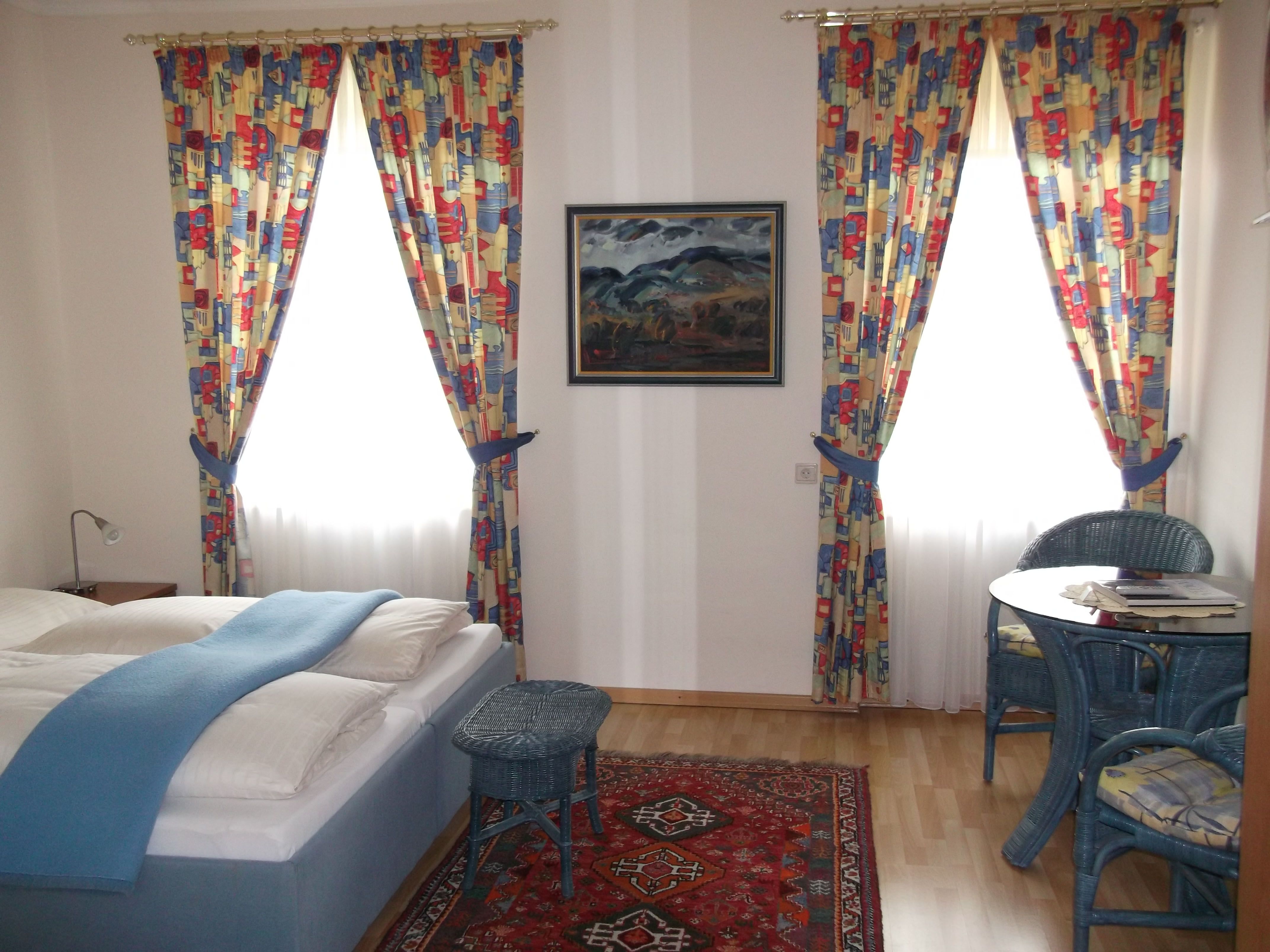 double bed room with blue furniture