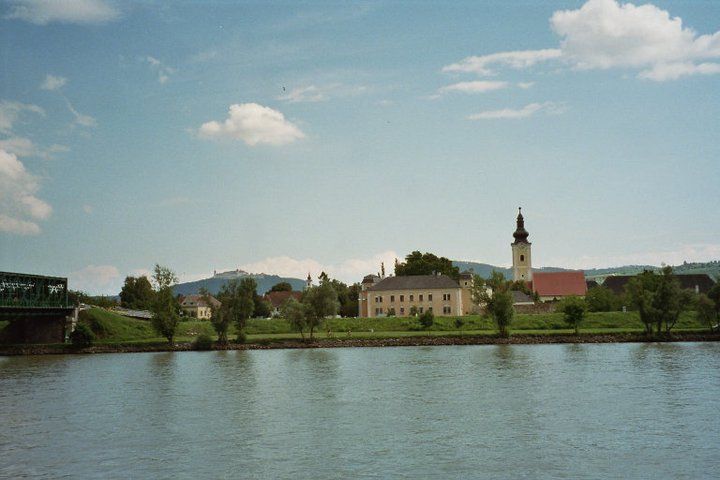 River landscape with church and bridge in Mautern, Austria.