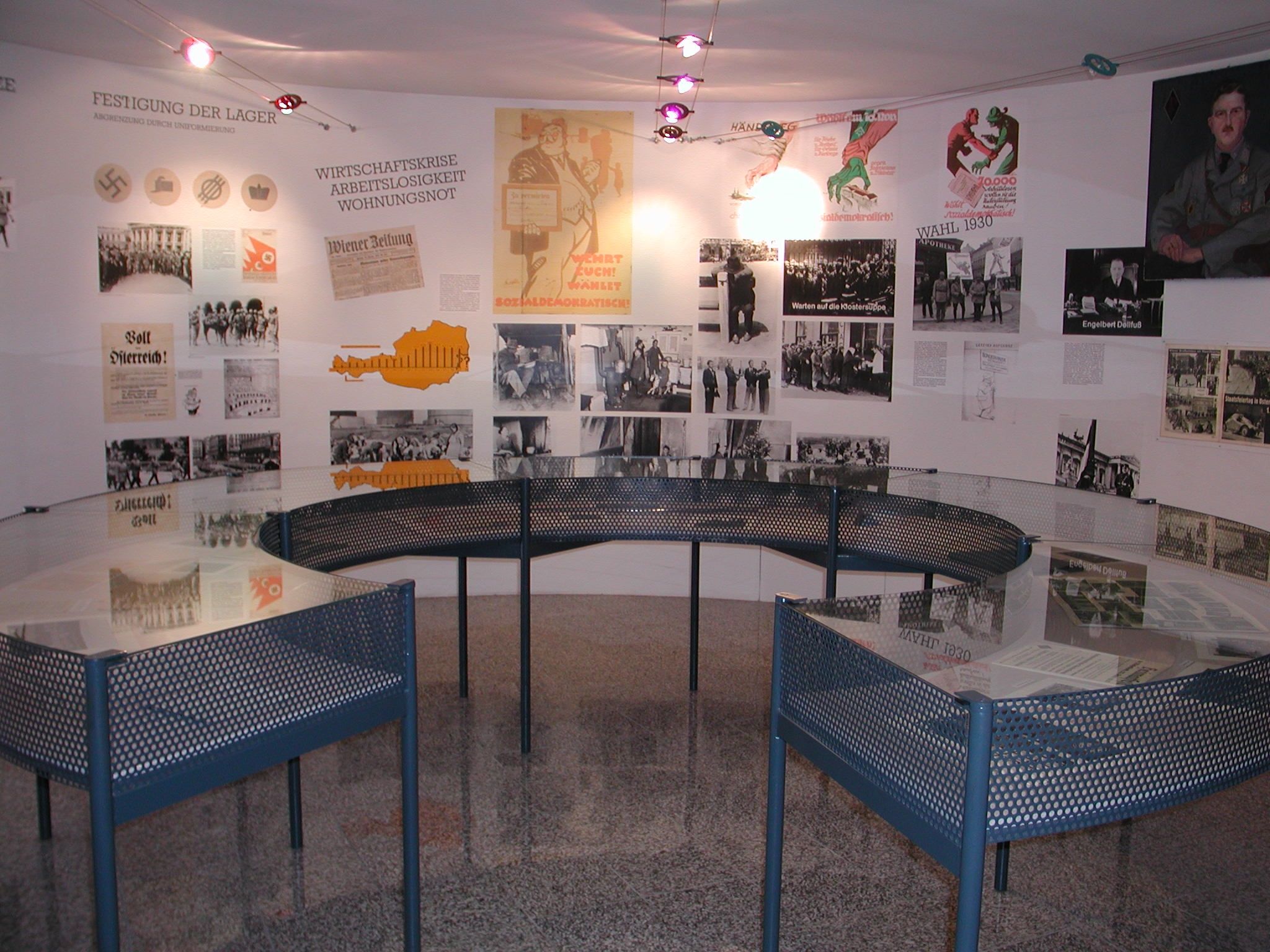 Interior view of the Leopold Figl Museum with historical photos and documents on the wall.