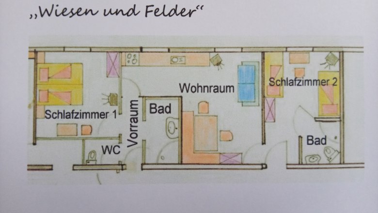 Floor plan of a vacation apartment with two bedrooms, living room, bathroom and WC.