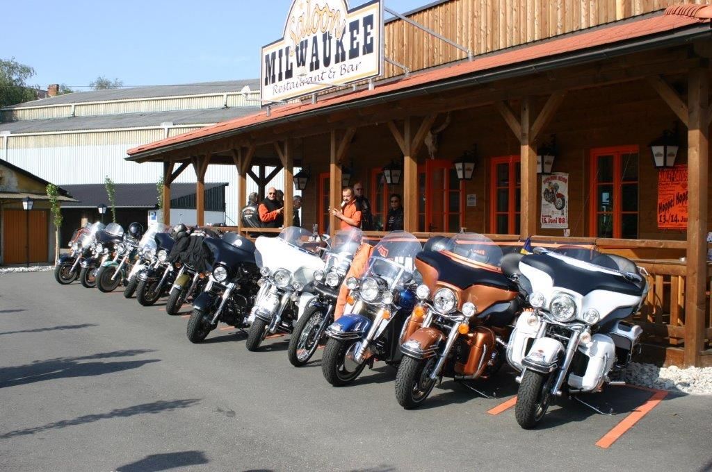 Motorcycles in front of the Saloon Milwaukee Restaurant and Bar.
