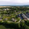 Aerial view of Schloss Grafenegg with castle and surrounding cottages.