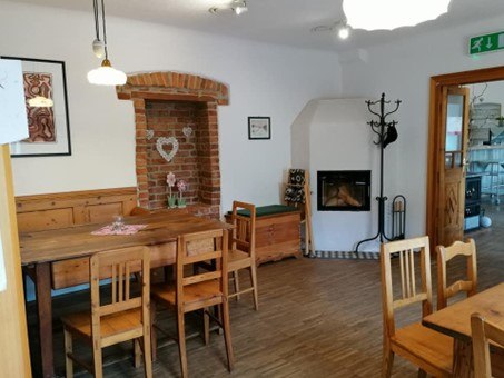 Extra room with open fireplace, © Dorfbründl