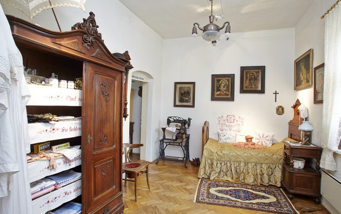 Historic room in the Kirchschlag town museum with antique furniture and decorations.