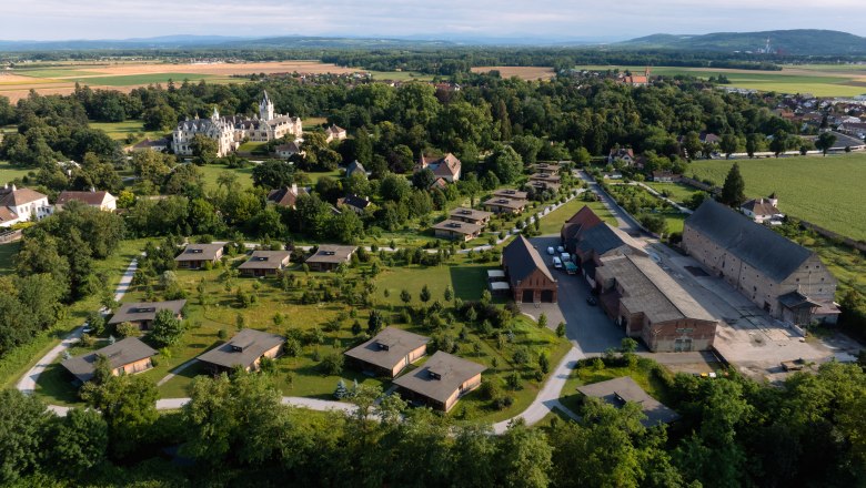 Aerial view of Schloss Grafenegg with castle and surrounding cottages.