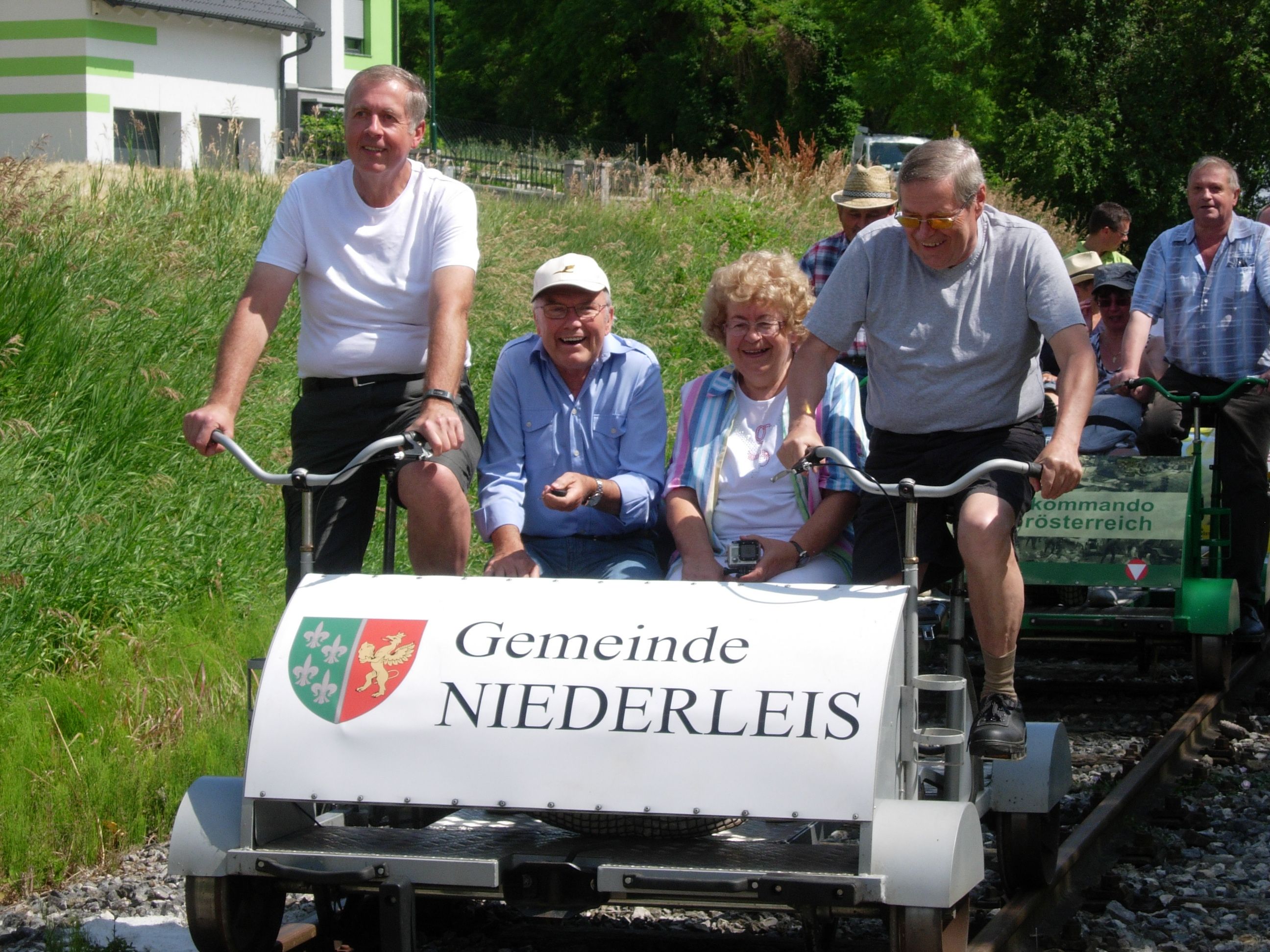 Group of people on a trolley in Niederleis.