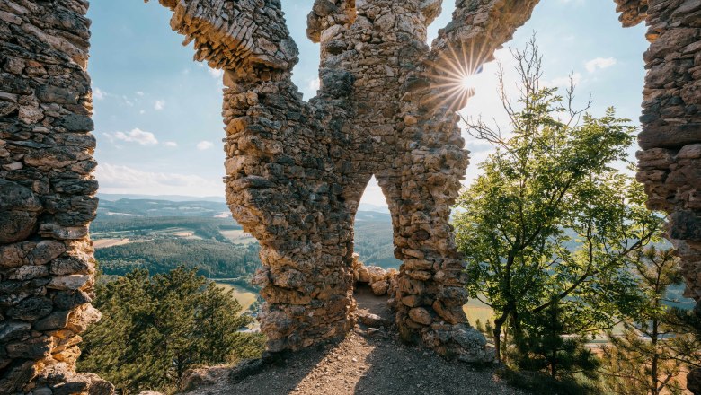 Ruin T&uuml;rkensturz with a view of the landscape and sunrays through the wall.