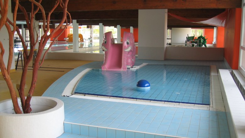 Children's pool with pink slide at the Stockerau recreation center.