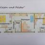 Floor plan of a vacation apartment with two bedrooms, living room, bathroom and WC.
