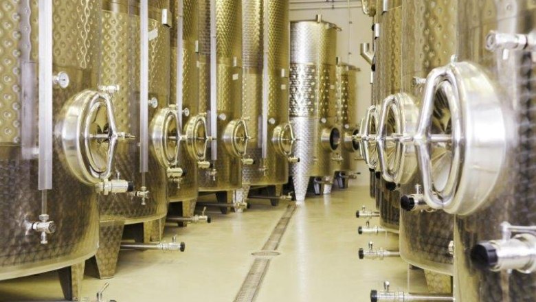 Modern wine barrels side by side.