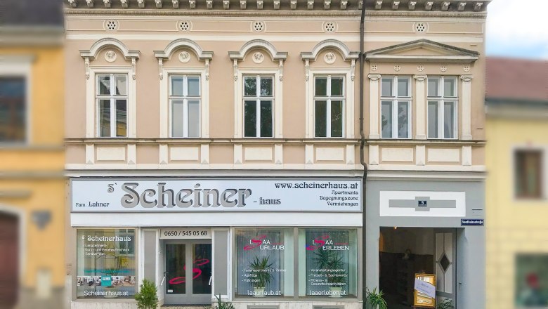 Façade of a two-storey building with the lettering 'Scheinerhaus'.