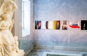 Interior view of the Arnulf Rainer Museum with sculpture and modern art on the wall.