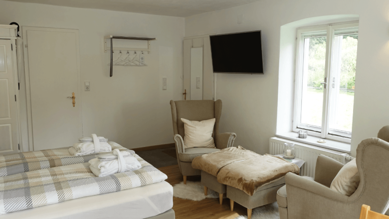 Cozy sofas in the green meadow guest mini bungalow, &copy; Ederm&uuml;hle