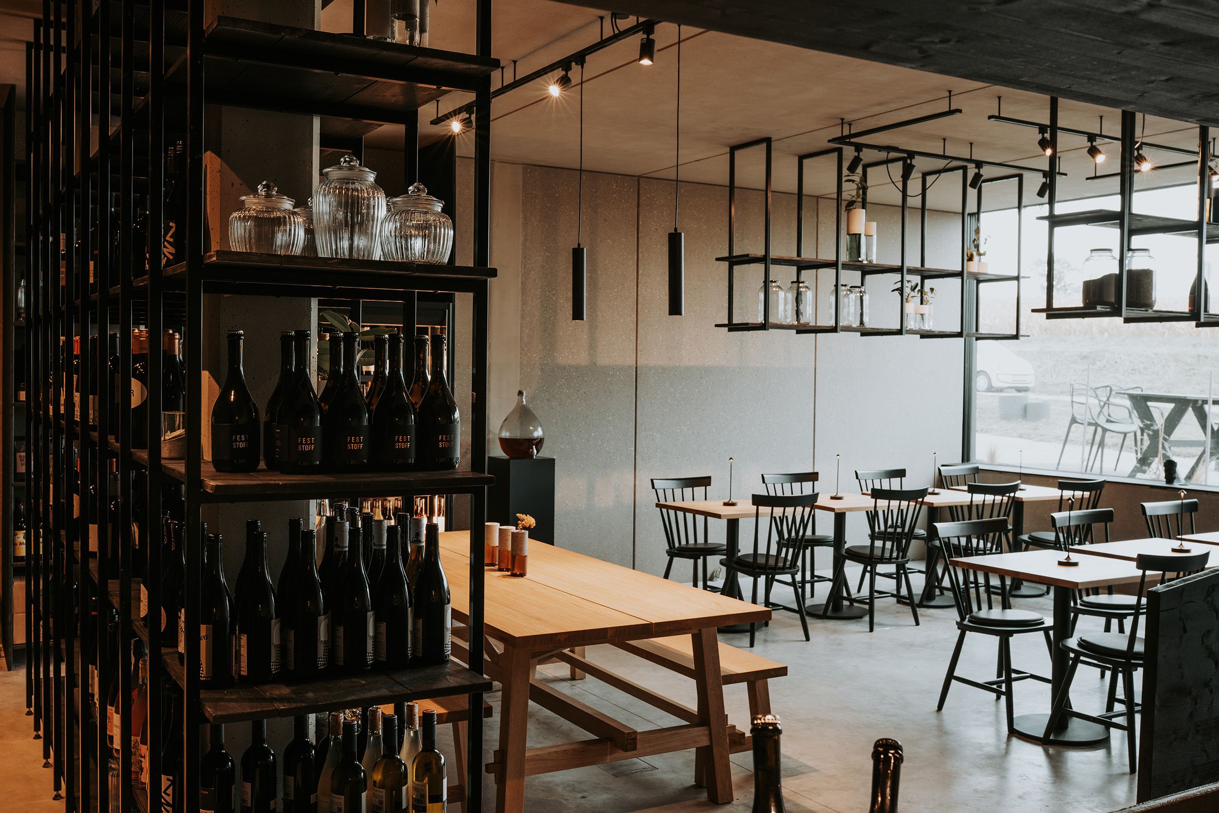 Wine rack, tables and armchairs