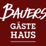 Logo with the text 'Bauers Gästehaus' in white on a dark red background.