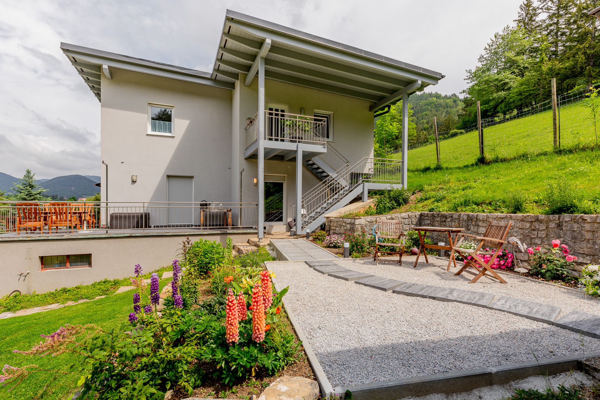 Modern vacation apartment with garden and terrace in a rural setting.