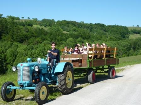 Into the mountains with the tractor!, © Familienbauernhof Pieringer