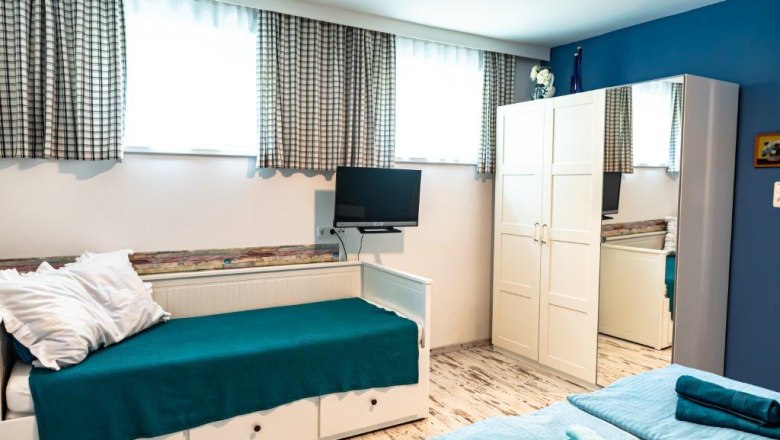 Bedroom with extra bed, © Hanifoto.at HANI OTTLIK