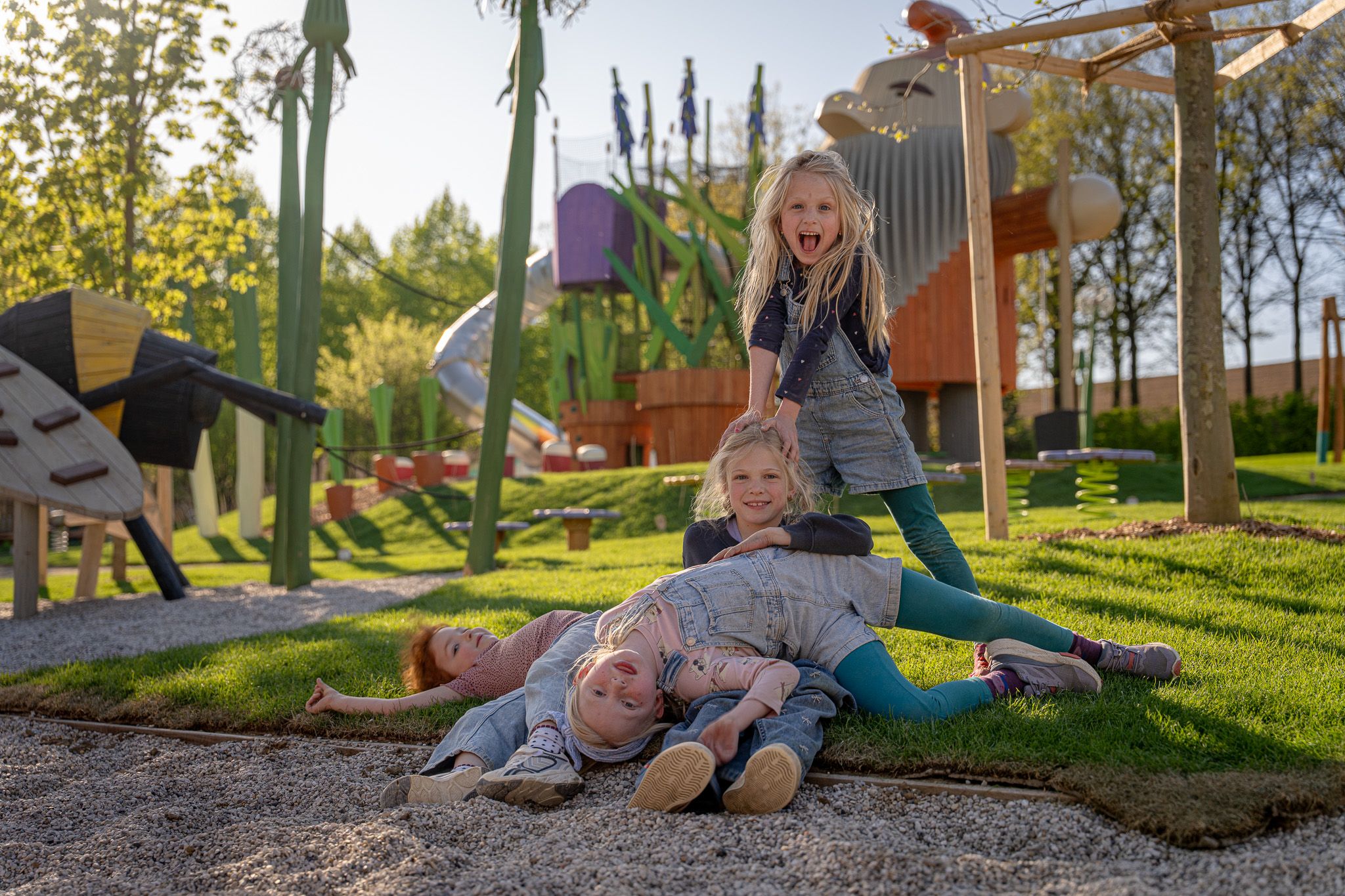 Children playing happily in a playground.