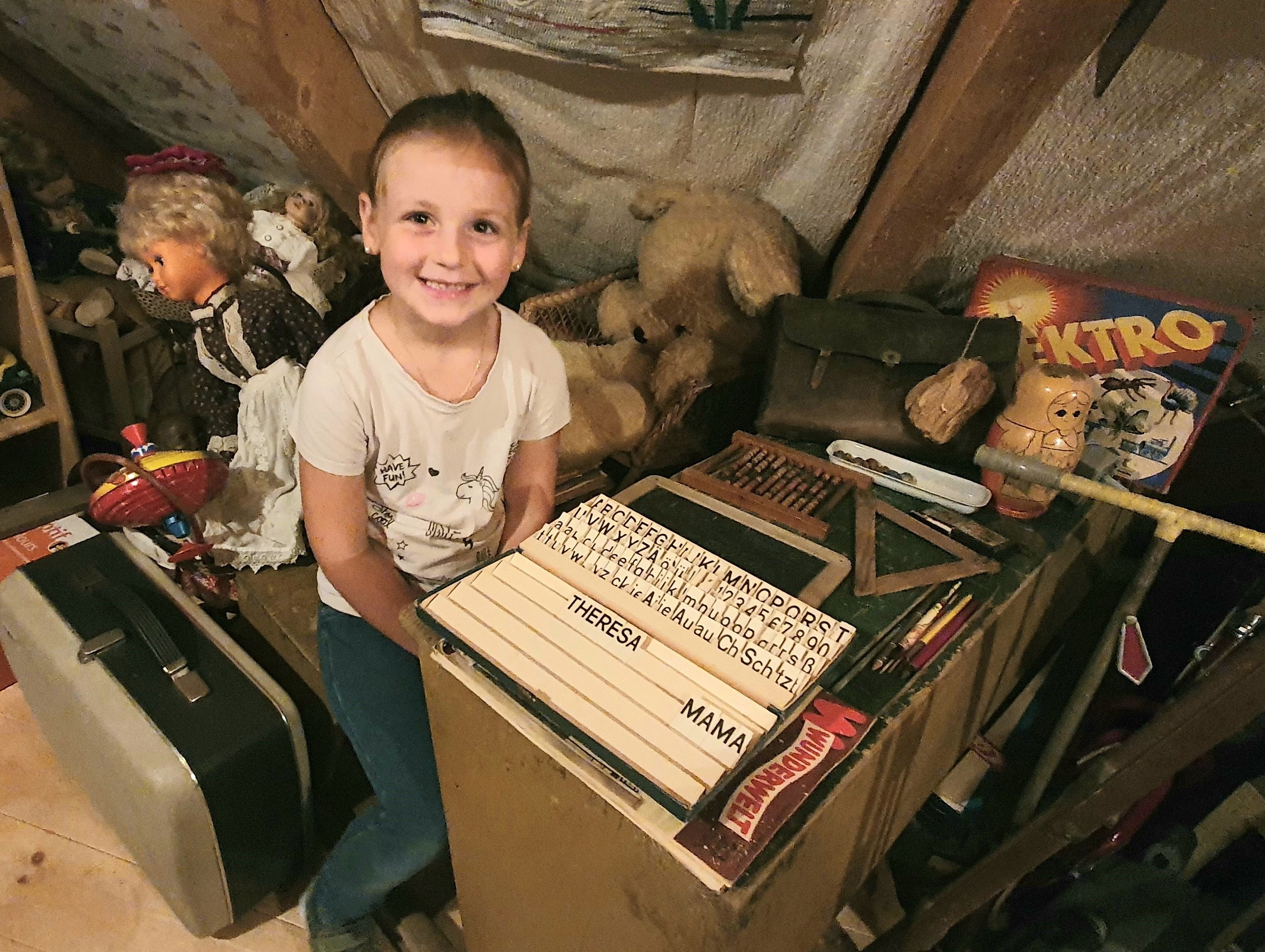 Theresa practicing as a preschooler at the setting box