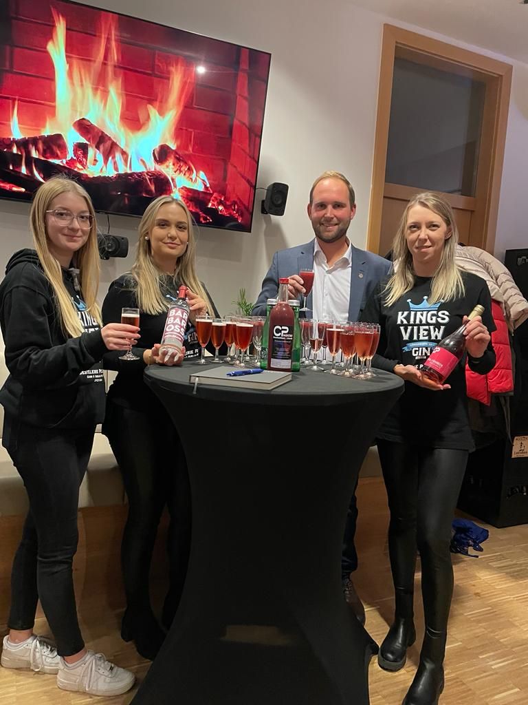 Four people at a tasting in the Forum
