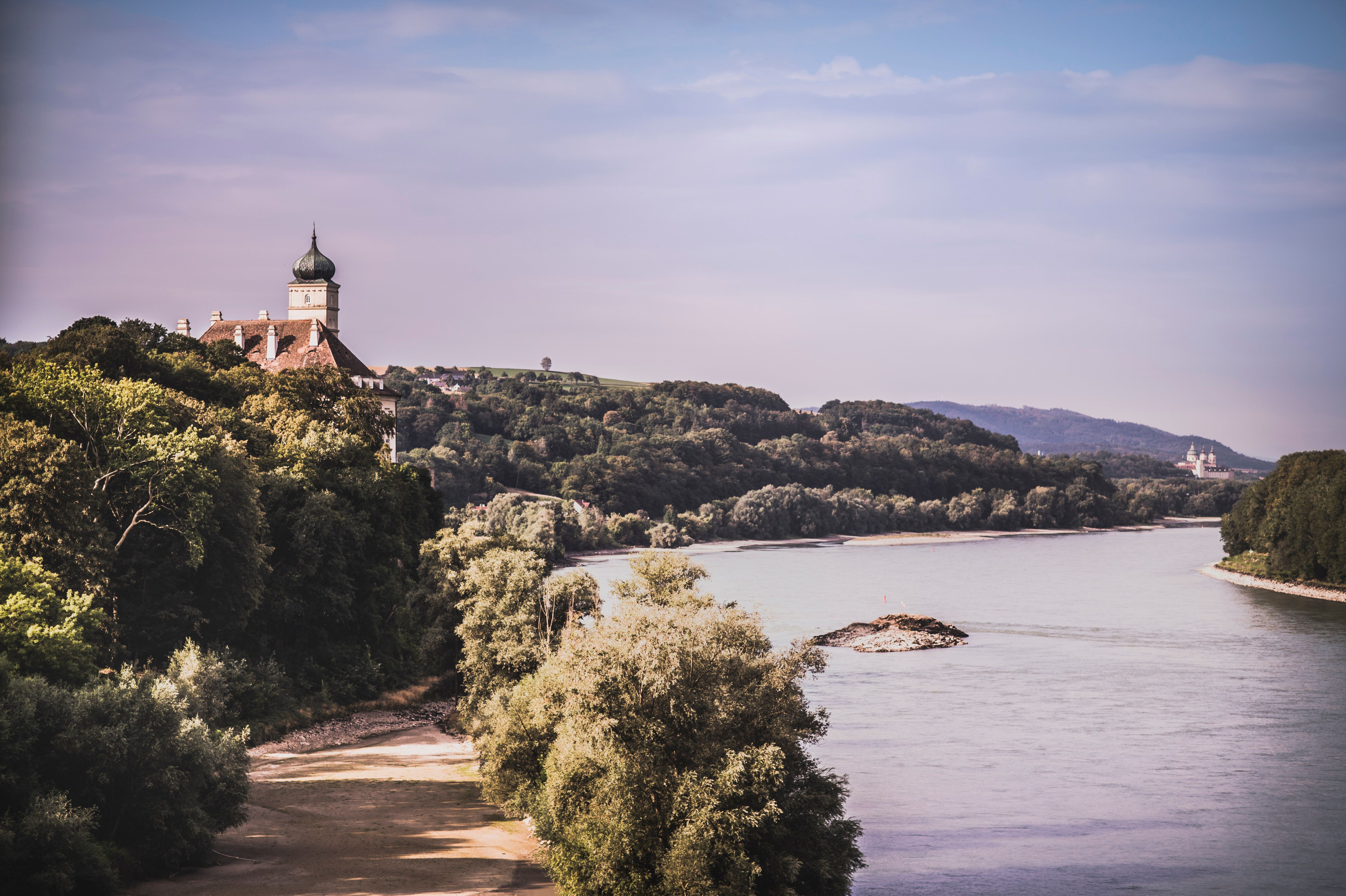 View of Schönbühel Castle and the Danube with wooded banks.