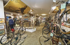 Interior view of the Retz Bicycle Museum with historic bicycles and exhibits.