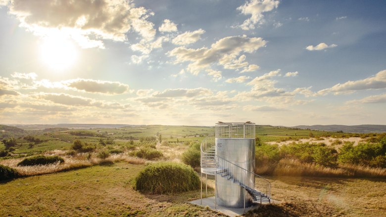 Observation tower in the Weinviertel with a view of the landscape at sunset.