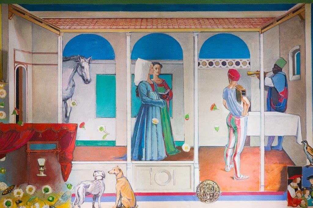 Fresco with medieval figures, a horse and dogs in an inner courtyard.
