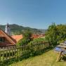 View of D&uuml;rnstein with church and deckchairs in the foreground.
