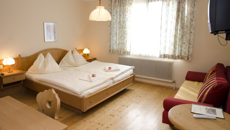 Guest room wooden floor south view, © Erika Berger