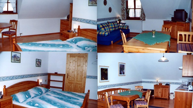 Interior view of a cozy vacation apartment with wooden furniture, bed, sofa and dining table.