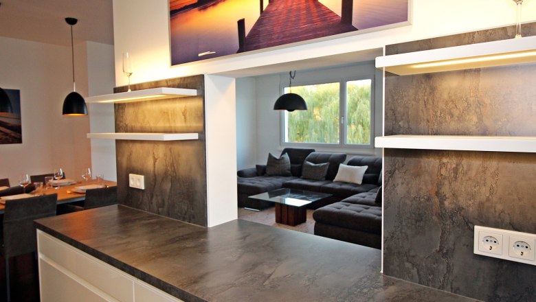 Kitchen with serving hatch towards the dining room