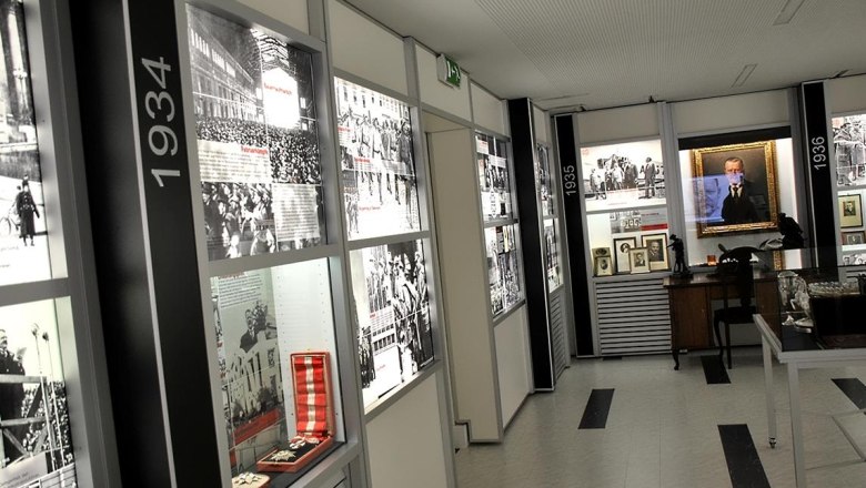 Interior view of a museum with historical photos and exhibits