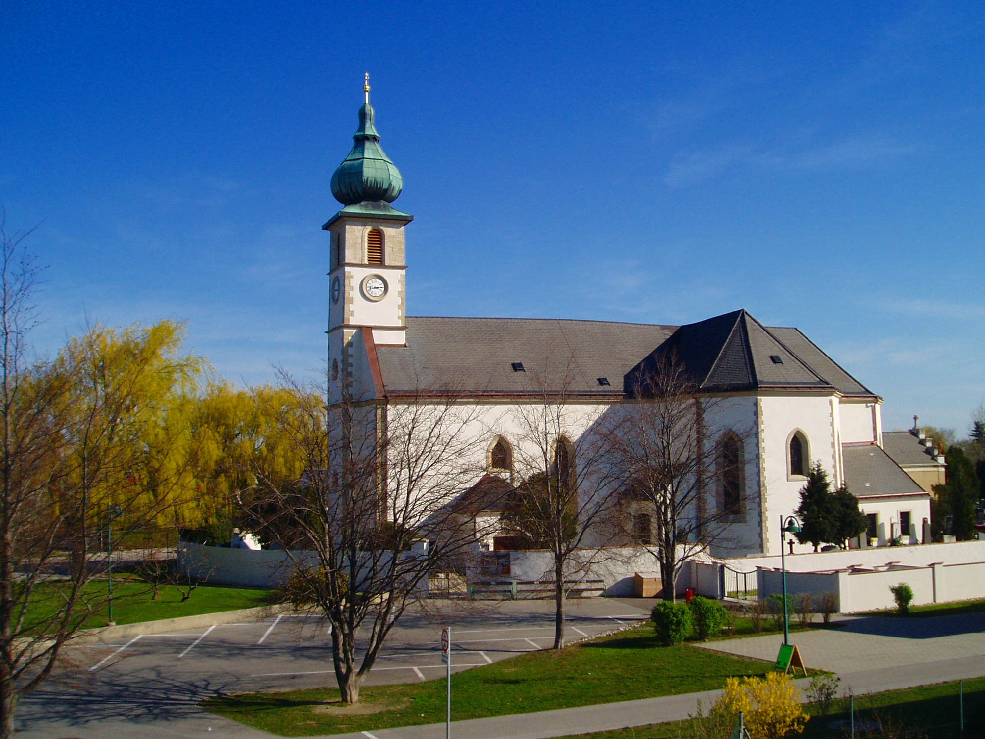 Church in Trumau with blue sky in the background.