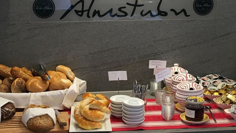 Breakfast buffet on the alpine pasture, &copy; Feriendorf Loimanns