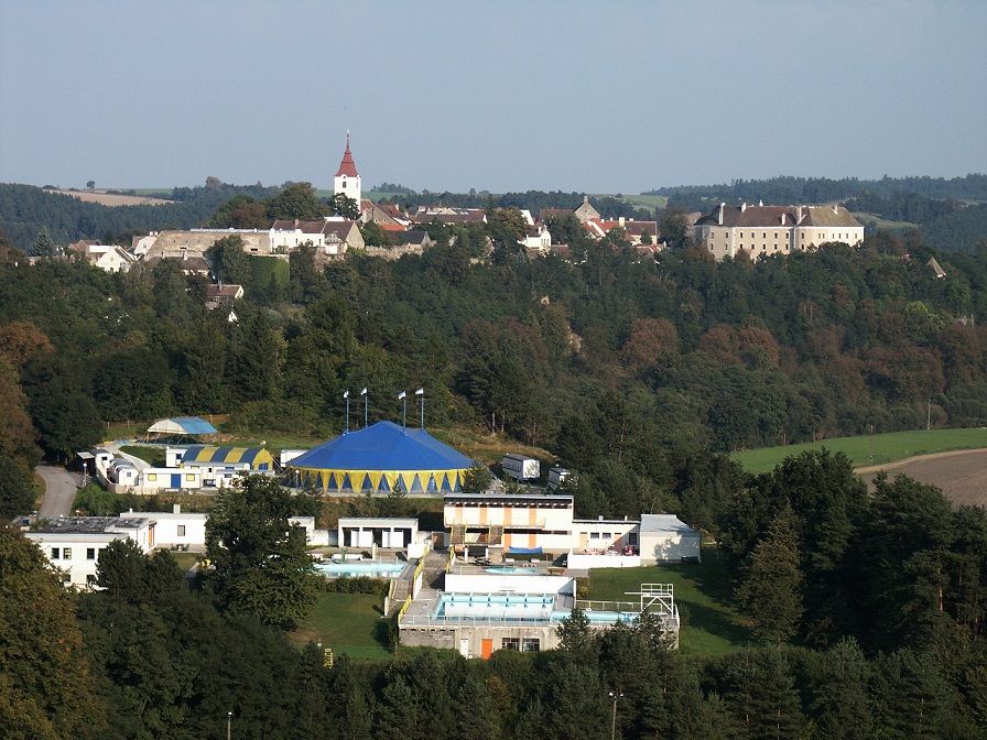 Landscape with circus tent, church and castle in Drosendorf.